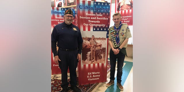 Ken DeLand poses as Eagle Scout