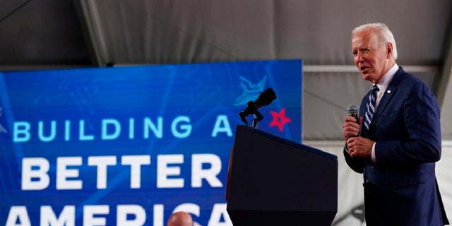 President Biden speaks about his economic agenda after touring the building site for a new computer chip plant for Taiwan Semiconductor Manufacturing Company in Phoenix, Arizona.