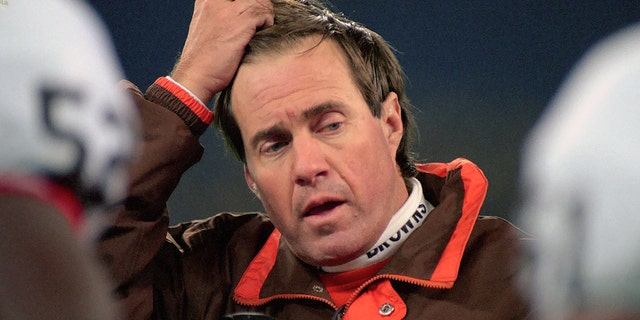 Head coach Bill Belichick of the Cleveland Browns looks on from the sideline during a game against the Pittsburgh Steelers at Three Rivers Stadium on November 13, 1995 in Pittsburgh, Pennsylvania.