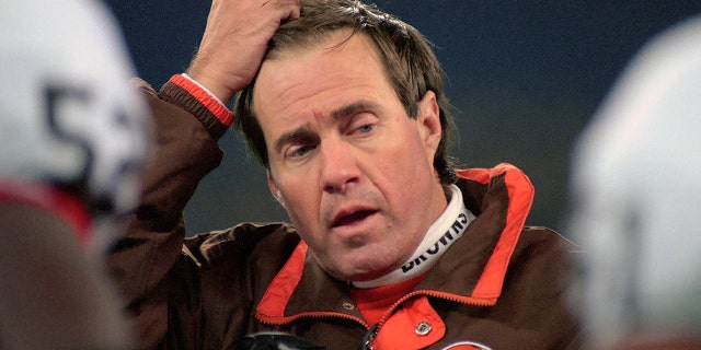 Head coach Bill Belichick of the Cleveland Browns looks on from the sideline during a game against the Pittsburgh Steelers at Three Rivers Stadium on November 13, 1995 in Pittsburgh, Pennsylvania.