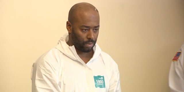 Alleged killer Michael Perry was caught dangling from a high-rise from his underwear.