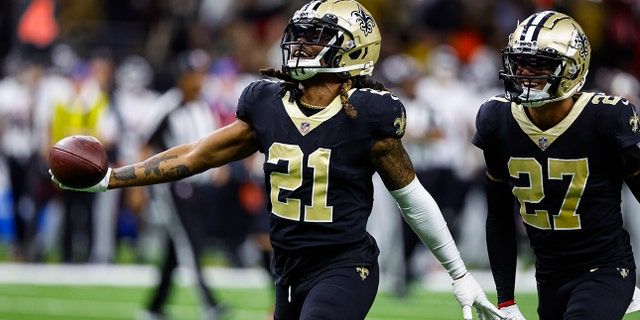 New Orleans Saints corner back Bradley Roby (21) celebrates a fumble recovery in front of cornerback Alontae Taylor (27) in the second half of an NFL football game against the Atlanta Falcons in New Orleans, Sunday, Dec. 18, 2022.