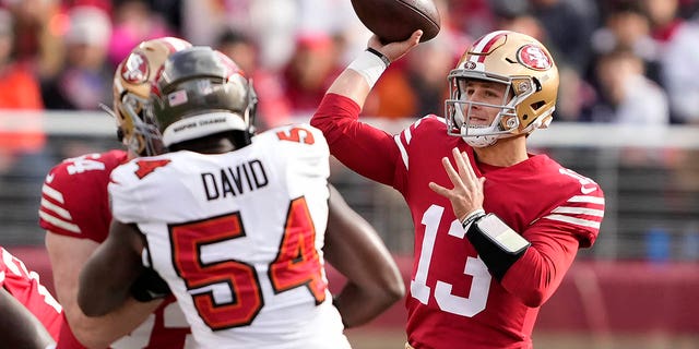 San Francisco 49ers quarterback Brock Purdy (13) passes against the Tampa Bay Buccaneers during the first half in Santa Clara, California, Sunday, Dec. 11, 2022.