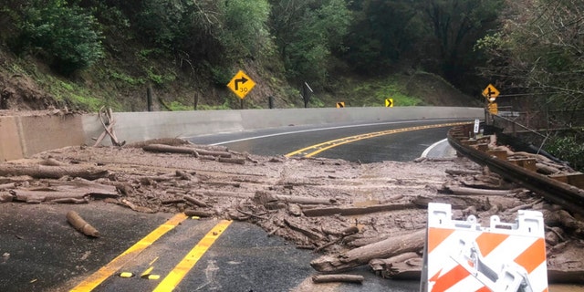 This Friday, Dec. 30, 2022, photo released by California Highway Patrol Dublin Area Office shows Niles Canyon Road closed between Pleasanton Sunol Road and Fremont near Palomares Road, in Alameda County, Calif. A landslide closed a highway in the San Francisco Bay Area as crews cleared rock and mud debris from Niles Canyon Road, also known as State Route 84, between Fremont and Sunol, according to the California Highway Patrol and Caltrans District 4. 