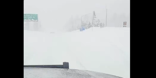 Whiteout conditions are seen Sunday, Dec. 11 along Interstate-80 in Northern California.