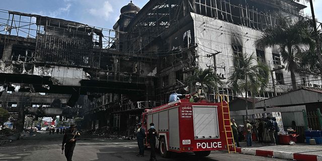 First responders from nearby Thailand are among those working the scene of the fire Thursday.