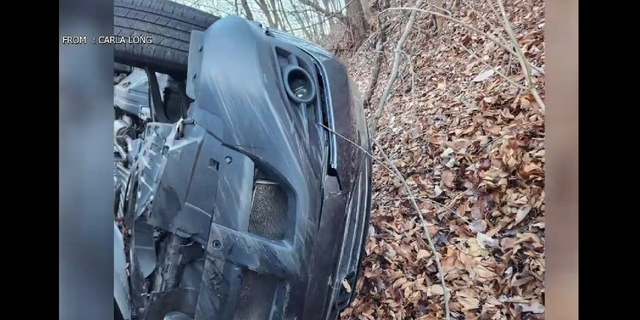 Carla Long's vehicle is seen Monday following the crash along Route 82.