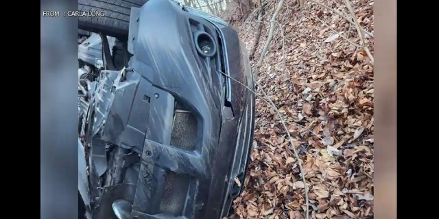 Carla Long's vehicle is seen Monday following the crash along Route 82.