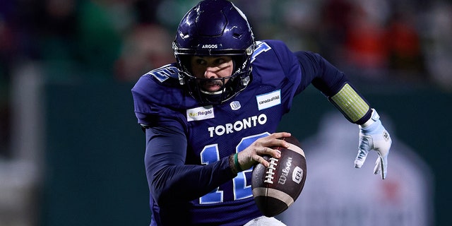 Toronto Argonauts number 12 Chad Kelly scrambles with the ball during the 109th Gray Cup game between the Toronto Argonauts and Winnipeg Blue Bombers at Mosaic Stadium on November 20, 2022 in Regina, Canada. 