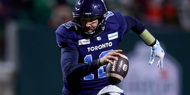 Chad Kelly #12 of the Toronto Argonauts scrambles with the ball in the 109th Grey Cup game between the Toronto Argonauts and Winnipeg Blue Bombers at Mosaic Stadium on November 20, 2022 in Regina, Canada.