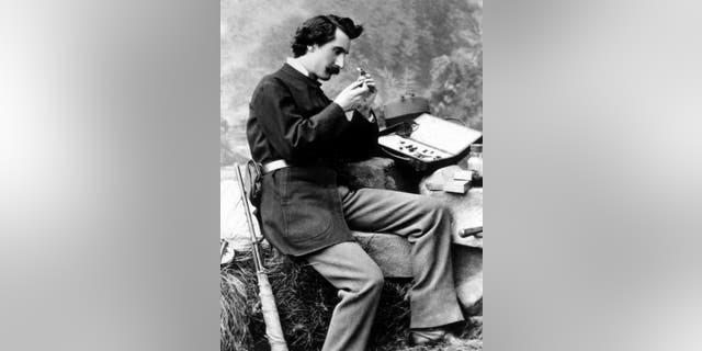 Renowned entomologist Charles Valentine Riley is shown with microscope. From the Charles Valentine Riley Papers at the National Agricultural Library of the U.S. Department of Agriculture.