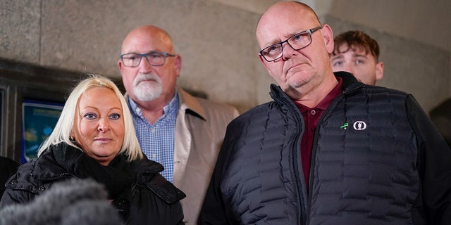 Charlotte Charles, left, mother of Harry Dunn, and Tim Dunn, the father, speak to the media outside the Old Bailey, in London, Thursday, Dec. 8, 2022. US citizen Anne Sacoolas, 45, has been given eight months suspended sentence for causing death by dangerous driving in the death of 19-year-old Harry Dunn, who was killed in a collision with a car outside an air base in eastern England in 2019.(AP Photo/Alberto Pezzali)