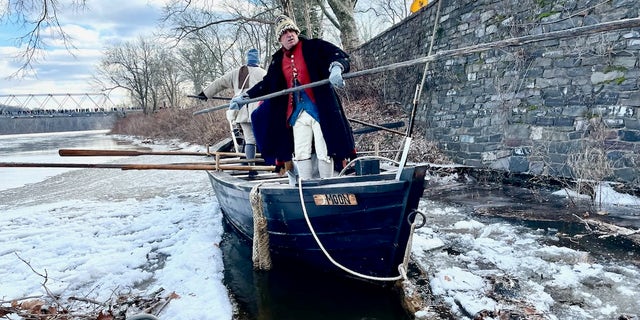 Revolutionary War reenactors attempted to free a boat from ice along the banks of the Delaware River on Christmas Day 2022. Temperatures were 10 degrees colder than when Washington famously crossed the river during his attack on Trenton, New Jersey, on Christmas Day 1776.