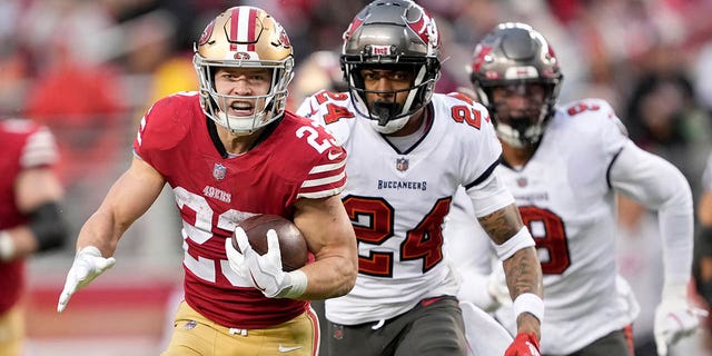 San Francisco 49ers running back Christian McCaffrey runs for a touchdown against the Tampa Bay Buccaneers on Sunday, December 11, 2022 in Santa Clara, Calif.
