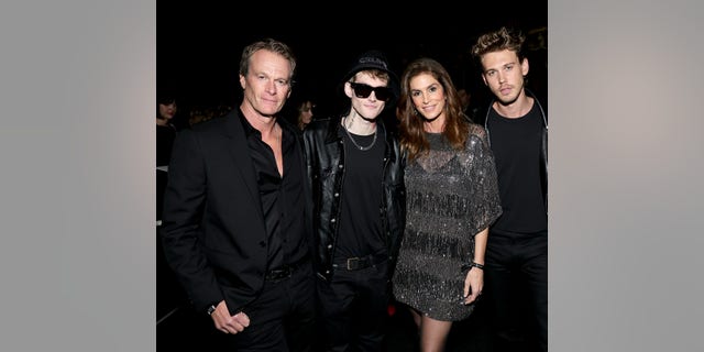 From left to right, Rande Gerber, Presley Walker Gerber, Cindy Crawford and Austin Butler attend Celine on Dec. 8, 2022 in Los Angeles.