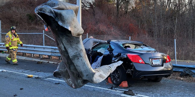 The driver of this car survived after their car was impaled by a guardrail during a crash in Manchester, Connecticut, on Dec. 26.