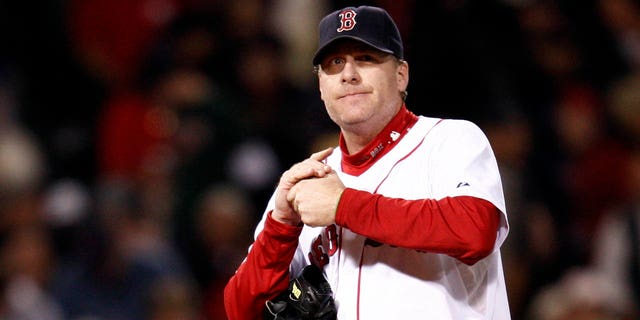 Red Sox pitcher Curt Schilling faces the Cleveland Indians during the playoffs in Boston on October 13, 2007.