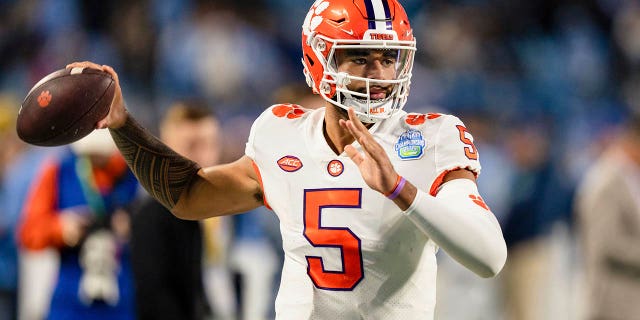 Clemson quarterback D.J. Uiagalelei warms up before the Atlantic Coast Conference championship game against North Carolina on Dec. 3, 2022.