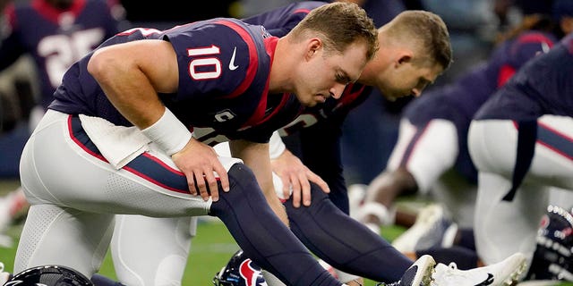 Houston's Davis Mills warms up before the Dallas game on Dec. 11, 2022, in Arlington, Texas.