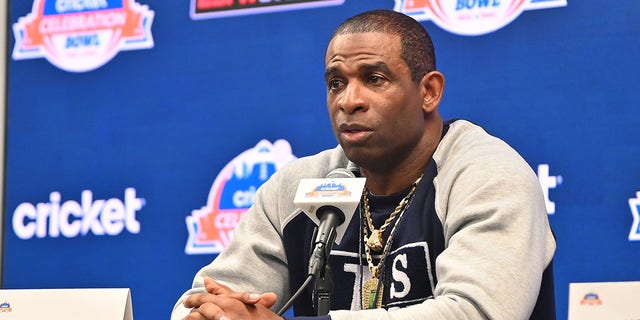 Head coach Deion Sanders of the Jackson State Tigers speaks with members of the press at the Jackson State University team press conference during Cricket Celebration Bowl Media Day at Mercedes-Benz Stadium Dec.16, 2022, in Atlanta.