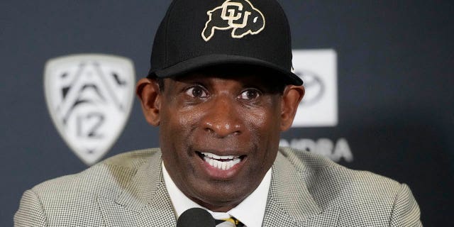 Deion Sanders speaks after being introduced as the new head NCAA college football coach at Colorado during a news conference Sunday, Dec. 4, 2022, in Boulder, Colo. 