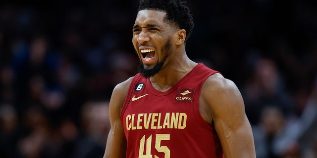 Cleveland Cavaliers guard Donovan Mitchell celebrates after scoring a three-point basket against the Indiana Pacers during the second half of an NBA basketball game, Friday, Dec. 16, 2022, in Cleveland. 
