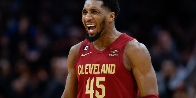 Cleveland Cavaliers guard Donovan Mitchell celebrates after scoring a three-point basket against the Indiana Pacers during the second half of an NBA basketball game, Friday, Dec. 16, 2022, in Cleveland.