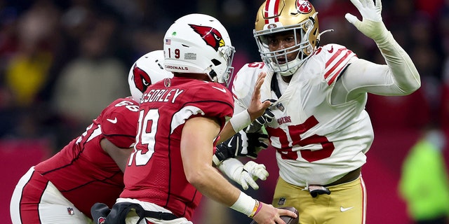 Drake Jackson, #95 of the San Francisco 49ers, pressures Trace McSorley, #19 of the Arizona Cardinals, during the fourth quarter at Estadio Azteca on Nov. 21, 2022 in Mexico City.