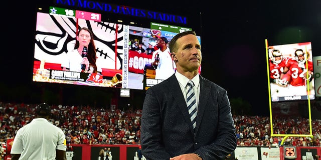 Drew Brees stands on the sideline during the game between the Tampa Bay Buccaneers and the Dallas Cowboys at Raymond James Stadium on Sept. 9, 2021 in Tampa, Florida.