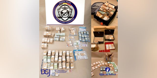 In this photo provided by the Belgian Federal Judicial Police on Wednesday, a portion of the 1.5 million euro dollars found and seized by Belgian police in Brussels. 