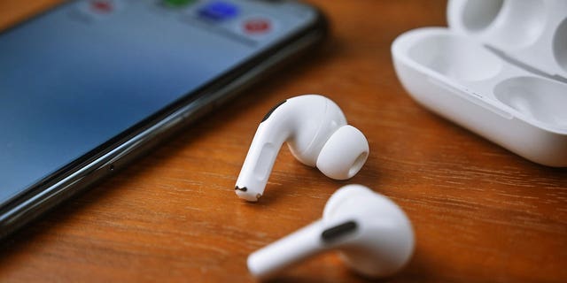 Stock photo of wireless earbuds for smart devices.