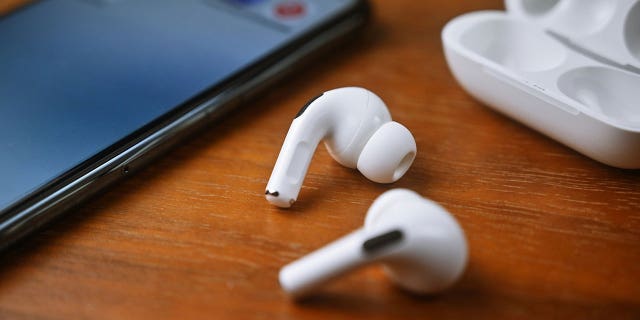 Stock photo of wireless earbuds for smart devices.