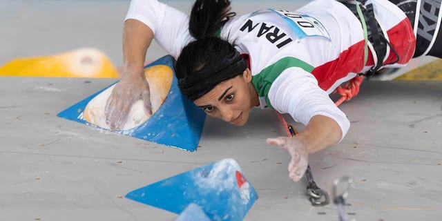 Iranian athlete Elnaz Rekabi competes during the women's Boulder Lead final during the IFSC Climbing Asian Championships in Seoul, Sunday, Oct. 16, 2022.