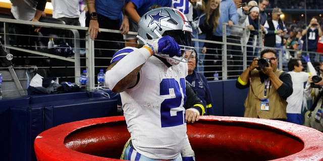 Ezekiel Elliott of the Cowboys celebrates a touchdown against the Indianapolis Colts on Dec, 4, 2022 in Arlington, Texas.