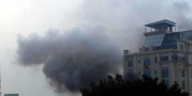 Smoke coming from a hotel that was attacked in Kabul, Afghanistan, on Dec. 12, 2022. 