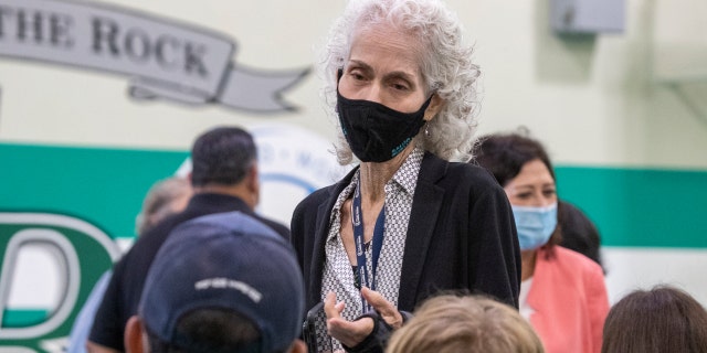 Eagle Rock, CA - August 30: Dr. Barbara Ferrer, center, director of the Los Angeles County Department of Public Health.