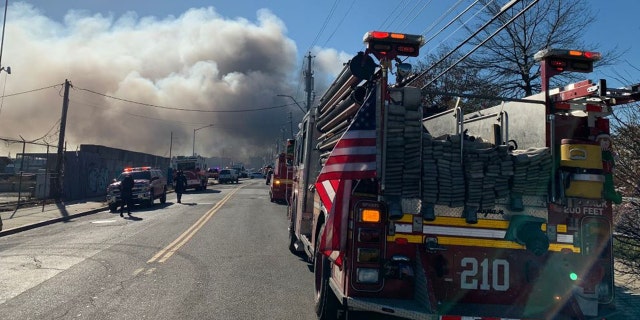 Firefighters responded to the massive blaze in Brooklyn just after 10:30 a.m.