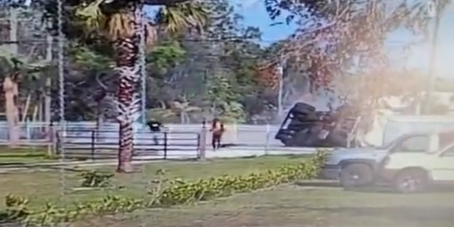 After the truck comes to a halt, the individuals who appeared to have been thrown out of the vehicle are seen walking away from the wreckage.