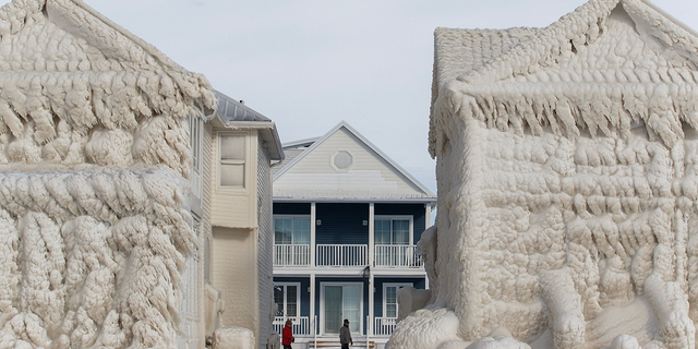 The homes were covered in ice from the ground to their roofs.