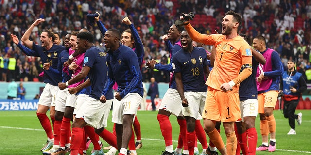 French players celebrate at the end of a FIFA World Cup Qatar 2022 quarterfinal match against England at Al Bayt Stadium Dec. 10, 2022, in Al Khor, Qatar.