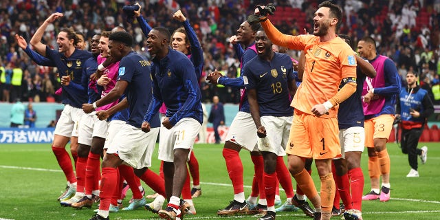 French players celebrate at the end of a FIFA World Cup Qatar 2022 quarterfinal match against England at Al Bayt Stadium Dec. 10, 2022, in Al Khor, Qatar.