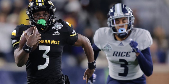 Frank Gore Jr. of the Southern Miss Golden Eagles rushes for a touchdown during the LendingTree Bowl on Dec. 17, 2022, in Mobile, Alabama.