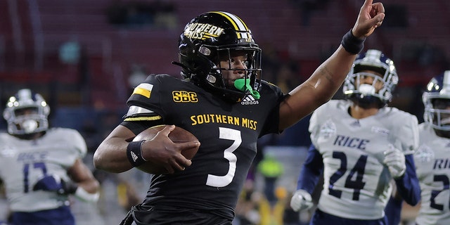 Frank Gore Jr. of the Southern Miss Golden Eagles rushes for a touchdown against the Rice Owls of the LendingTree Bowl at Hancock Whitney Stadium on Dec. 17, 2022, in Mobile, Alabama.