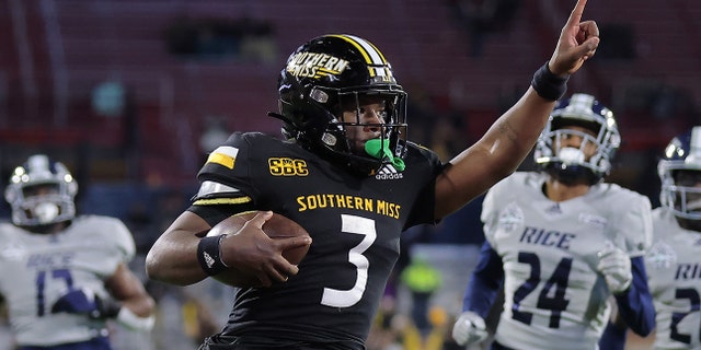 Frank Gore Jr. of the Southern Miss Golden Eagles rushes for a touchdown against the Rice Owls of the LendingTree Bowl at Hancock Whitney Stadium on Dec. 17, 2022, in Mobile, Alabama.