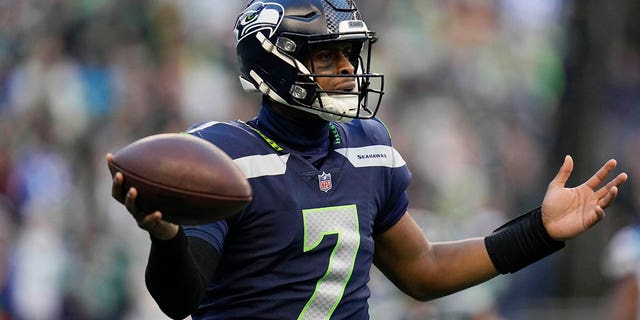 Seattle Seahawks quarterback Geno Smith (7) reacts to an incomplete pass against the Carolina Panthers during the second half, Sunday, Dec. 11, 2022, in Seattle.