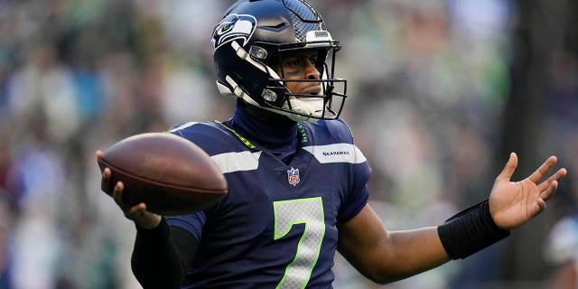 Seattle Seahawks quarterback Geno Smith (7) reacts to an incomplete pass against the Carolina Panthers during the second half, Sunday, Dec. 11, 2022, in Seattle.