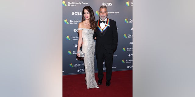 George Clooney joked about his family life as an honoree at Kennedy Center Honors with wife Amal Clooney. 