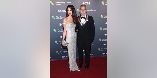 George Clooney joked about his family life as an honoree at Kennedy Center Honors with wife Amal Clooney.