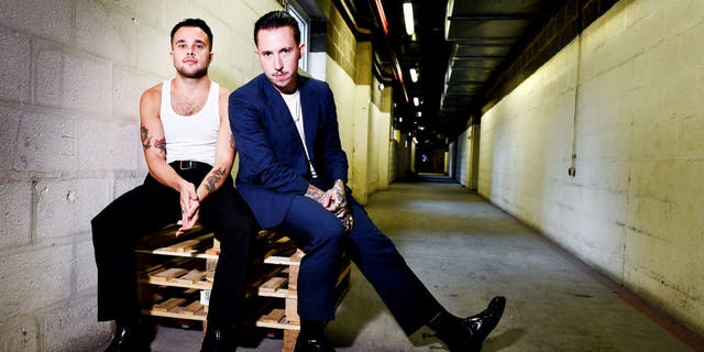 The U.K. punk rock duo, which consists of frontman Laurie Vincent and drummer Isaac Holman, have performed under the name Slaves since forming the band in 2012.