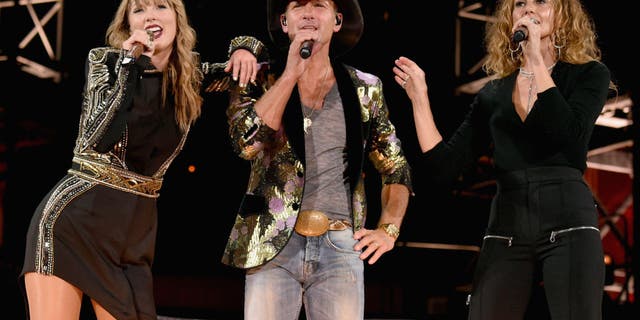 Taylor Swift, Tim McGraw and Faith Hill perform onstage during the Reputation Stadium Tour at Nissan Stadium on August 25, 2018, in Nashville.